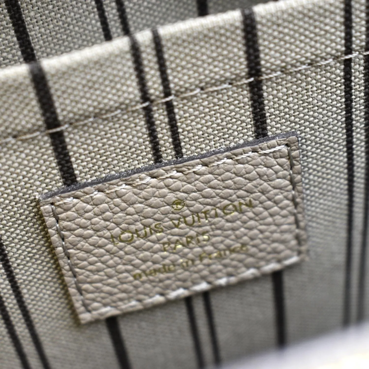 LOUIS VUITTON Montaigne MM Monogram Empreinte Shoulder Bag Tourterelle